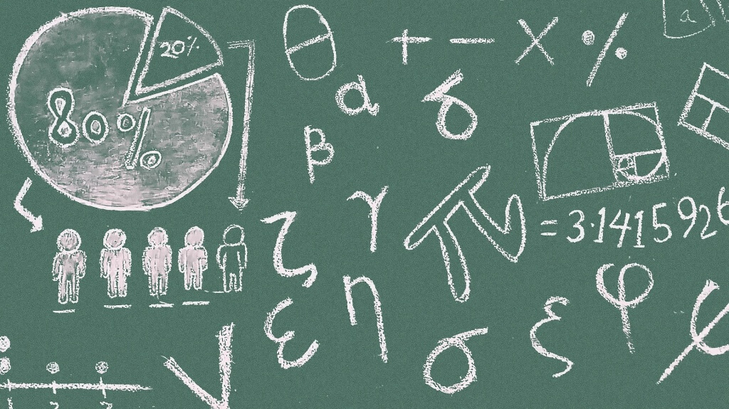 Math symbols on a chalkboard