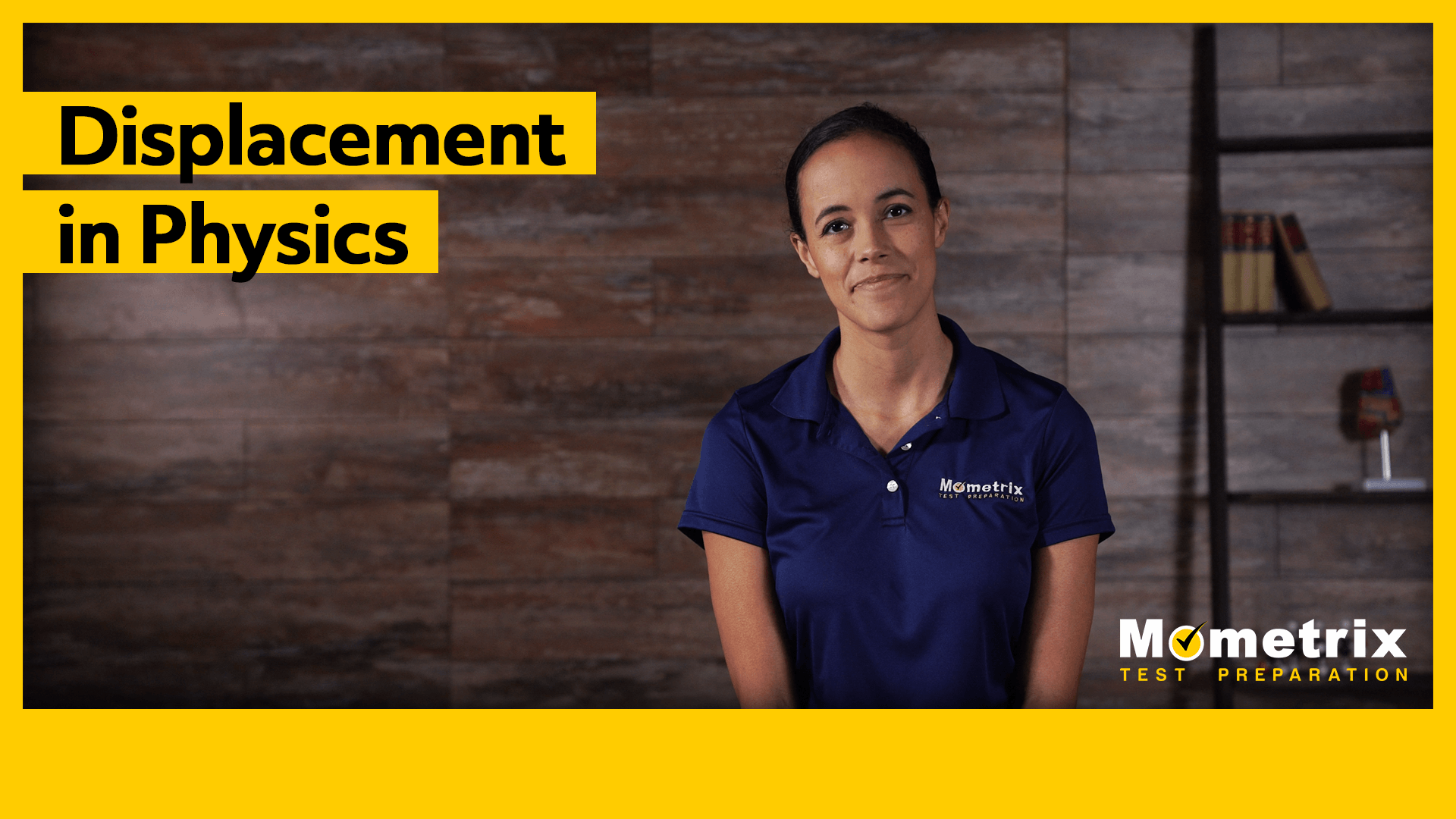 A woman in a blue Mometrix polo is presenting a lesson on "Displacement in Physics." The background features a wooden wall and bookshelves.