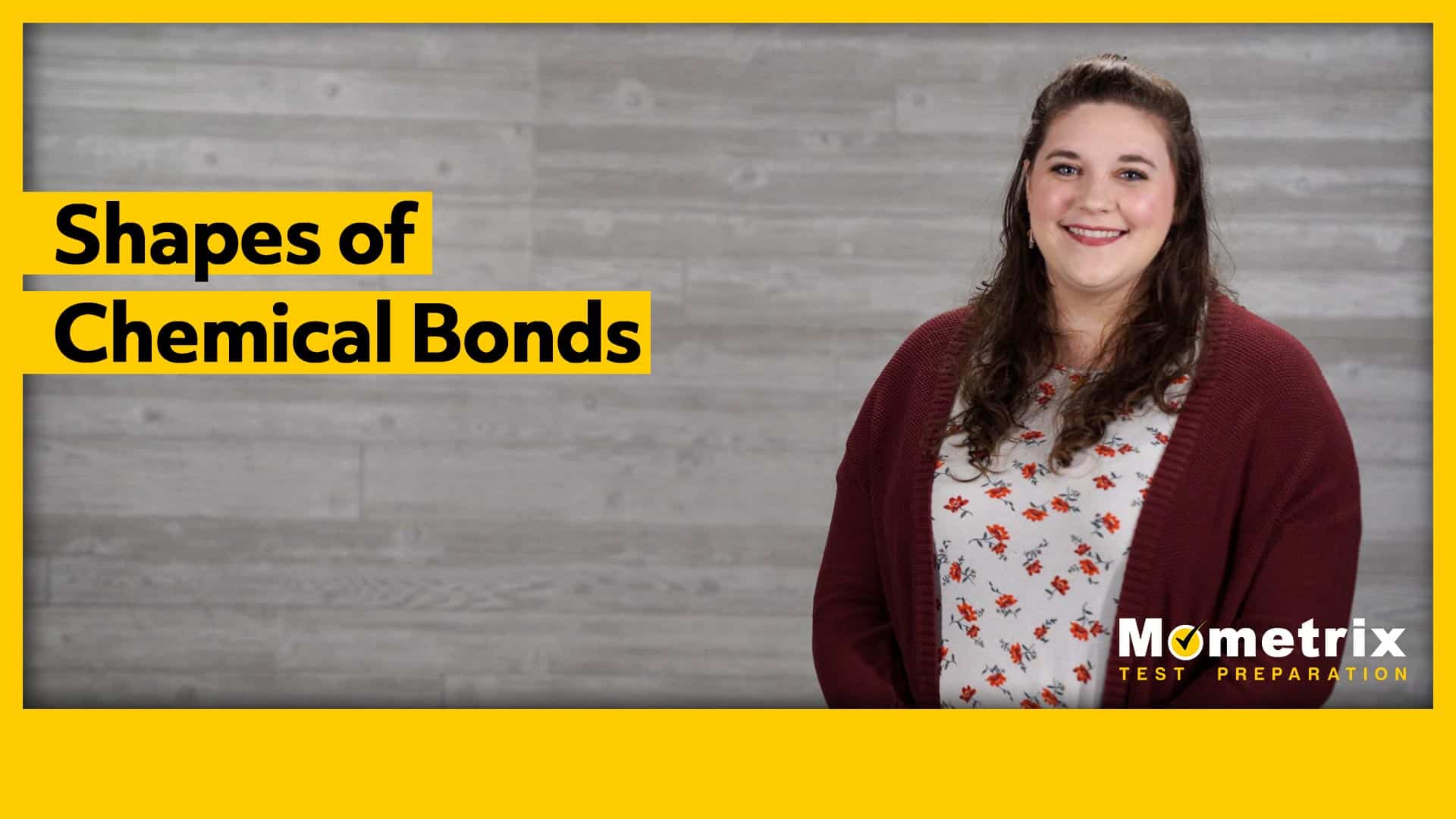 A woman in a maroon cardigan and floral blouse stands next to text that reads "Shapes of Chemical Bonds." The image is framed with a yellow border and includes "Mometrix Test Preparation" in the bottom right corner.